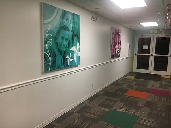 Faith Covenant Church1 Big corporate art of kids in hall - green color